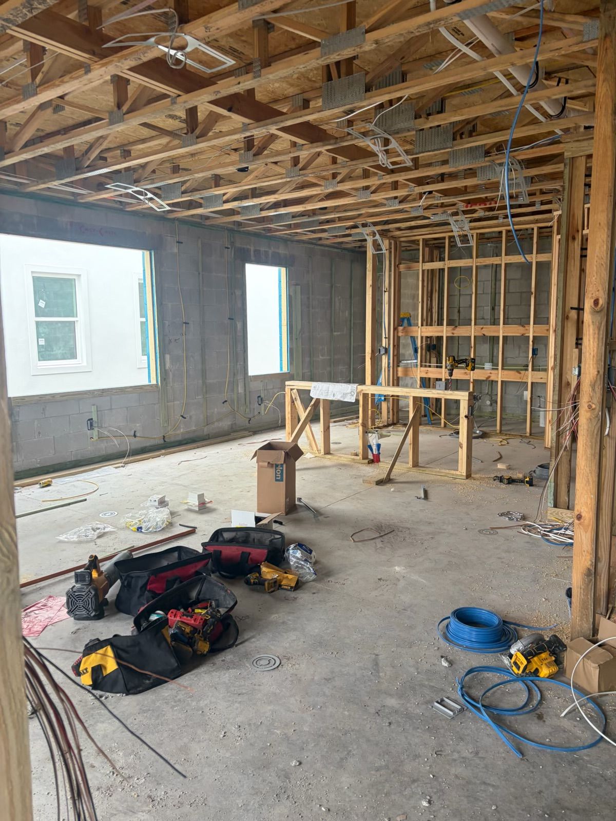 Construction progress: First-floor framing with electrical rough-in underway