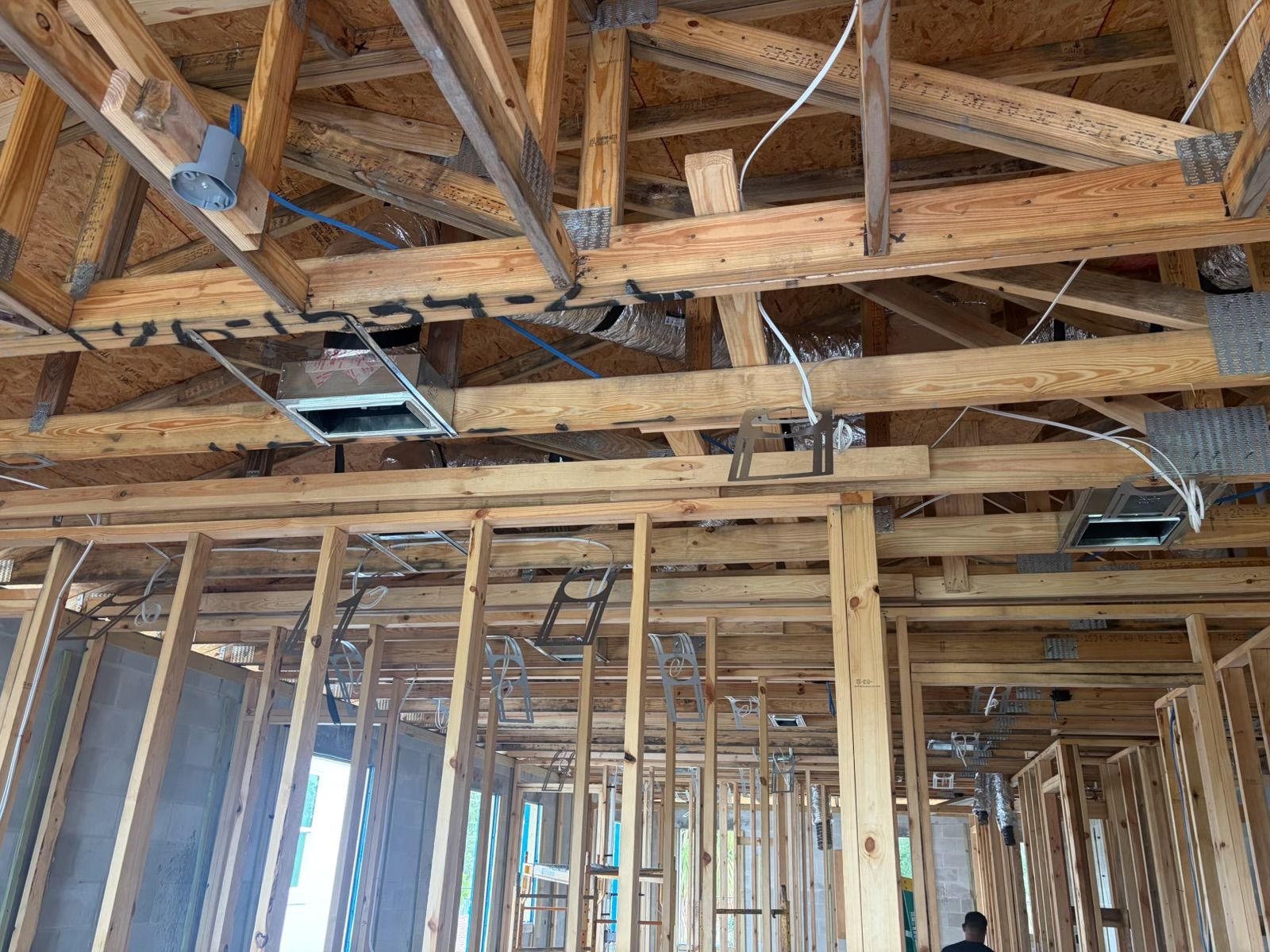 Construction progress: Ceiling framing with HVAC ductwork and wiring