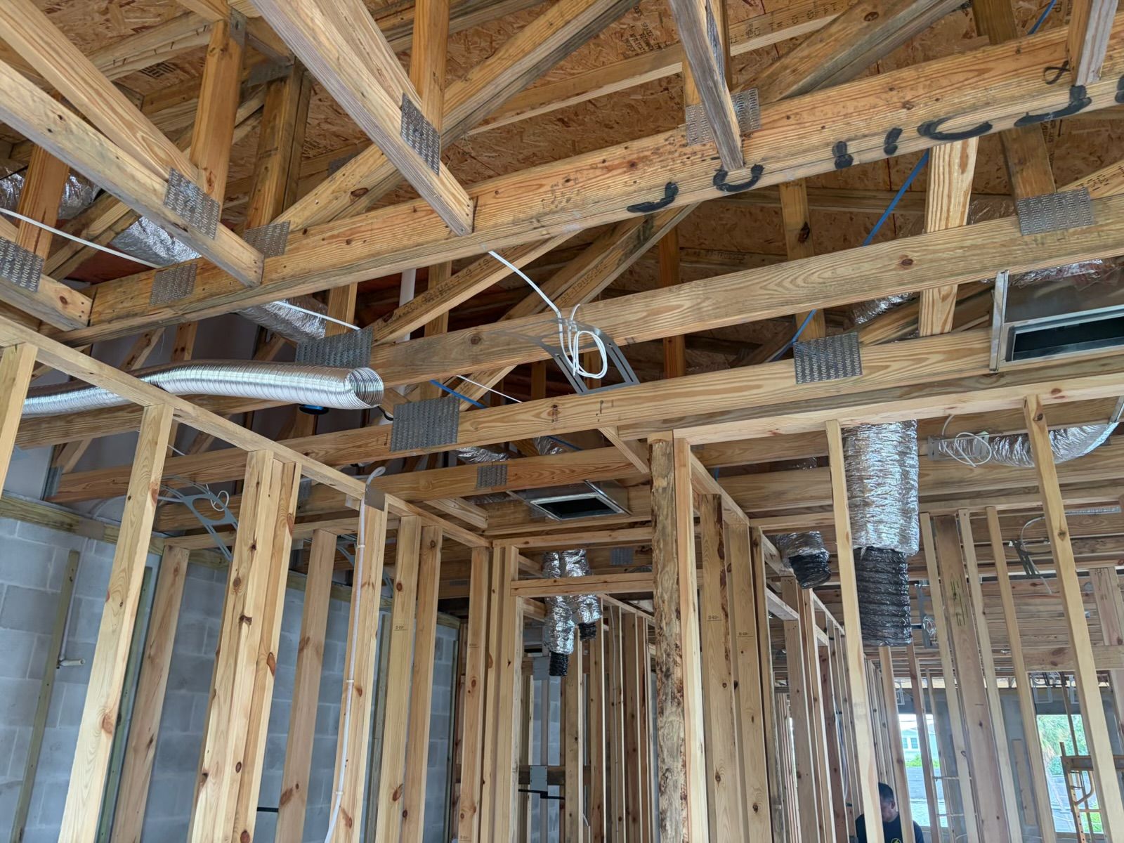 Construction progress: HVAC ducts and wiring run through the ceiling